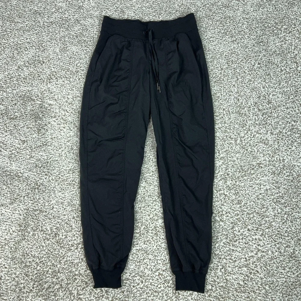 Lululemon Pants Womens 6 Black Jogger Dance Stuido Tapered Pockets Yoga Gym Logo